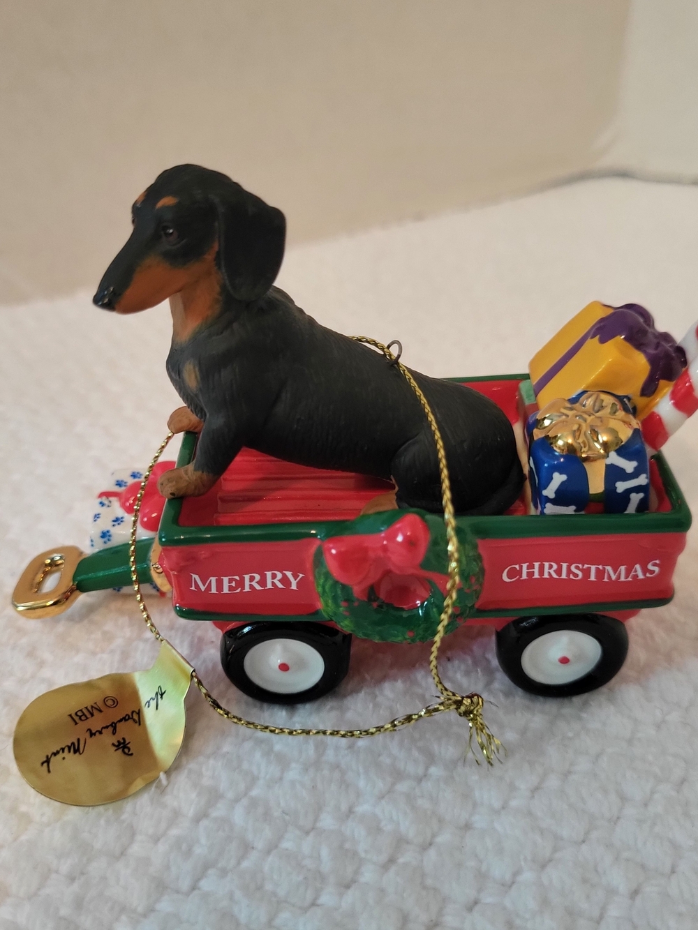 Danbury Mint Black Dachshund in Red Christmas Wagon Ornament